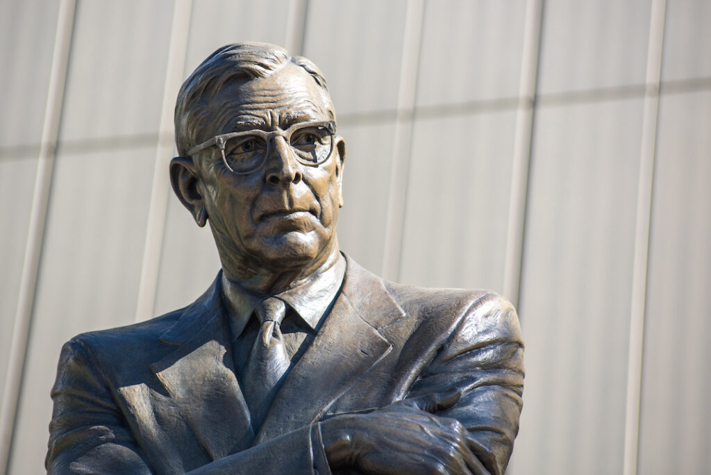 Statue of UCLA coach John Wooden on the UCLA campus. UCLA is a public university located in the Westwood area of Los Angeles.